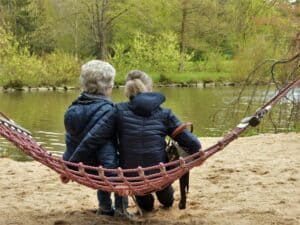 women with dementia care on a rope swing